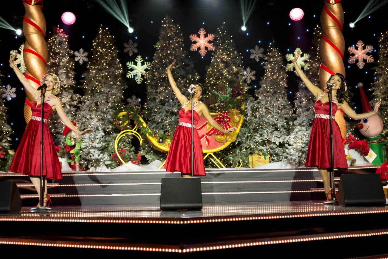 The Sugarplums perform a Christmas classic on stage for The CW's Christmas Caroler Challenge