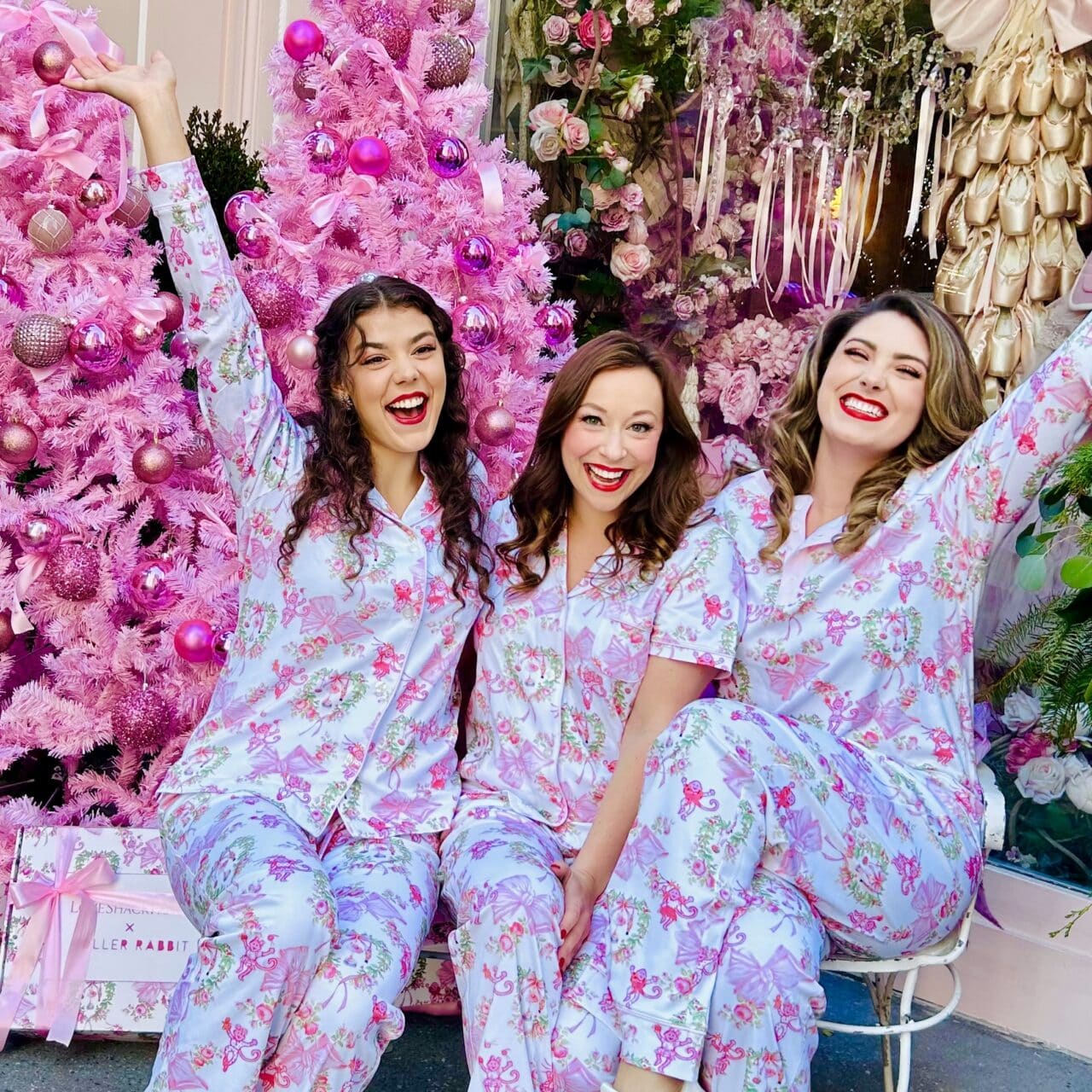 The Sugarplums outside a Love Shack Fancy in New York City in pajamas